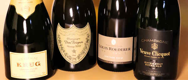 Premium champagne bottles including Krug, Dom Pérignon, Louis Roederer, and Veuve Clicquot