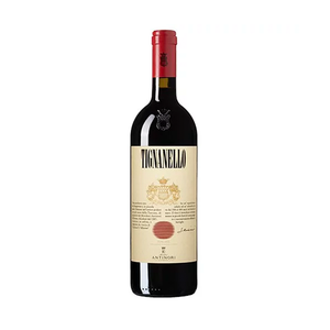A bottle of Antinori Tignanello wine with a red cap and a label featuring gold text and a crest.