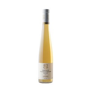 A bottle of Domaine Franco Chinois wine with a golden hue and white label.