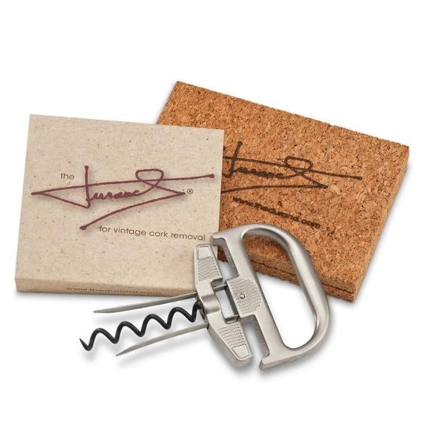 The image shows a Durand corkscrew, with a silver-colored metal frame and handle, alongside its packaging that reads 'DURAND for vintage cork removal'.