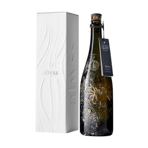 A bottle of Leclerc Briant Abyss Brut Zero 2018 champagne with a decorative pattern on its surface, alongside its white box, displaying the product name and branding.