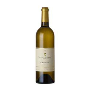 Wine bottle with 'Peter Michael' label on a white background