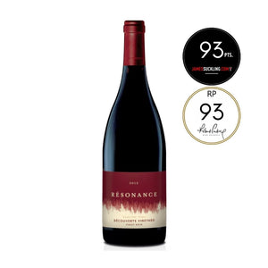 Red wine bottle with 'Resonance' label and James Suckling scores on a white background